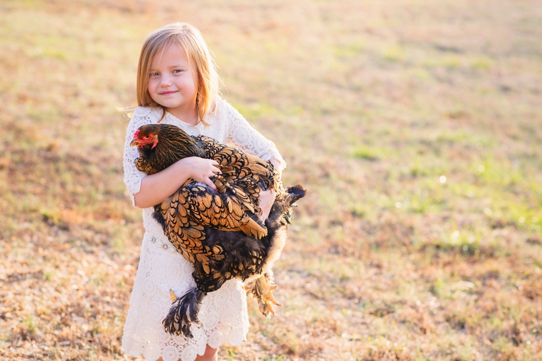 A girl and her chicken